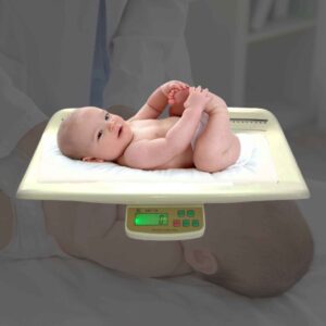 Alpha SRSB125 digital baby scale with a baby on the tray