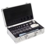 Open aluminium weight box with 23 stainless steel weights in foam slots