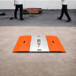 Weigh pad with ramps on a concrete floor
