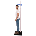 Man standing on the stadiometer while his height is measured