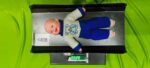 Baby doll in the tray of the BCA180A baby cum adult scale
