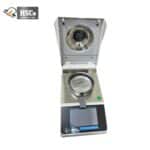 Moisture analyzer with lid open, top view of the pan
