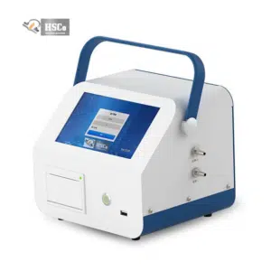 HSCo respirable dust sampler shown from the front right with a blue handle, touchscreen and two side ports