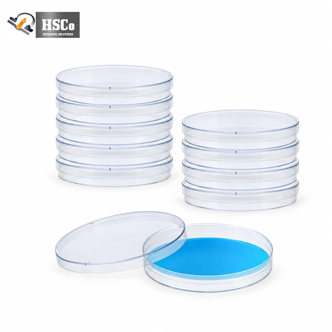 PETRI DISHESH Stacks of clear sterile plastic Petri dishes, one with blue culture medium