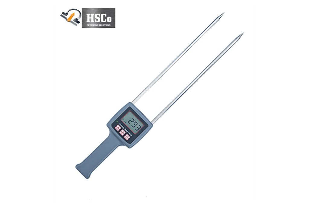 Paddy moisture at the mandi: how much of the weight is water 4 HSCo TK100 hand-held moisture meter with a backlit display, three keys and two long steel probes